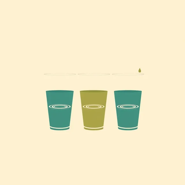 Three glasses with ripples on the surface of the water.